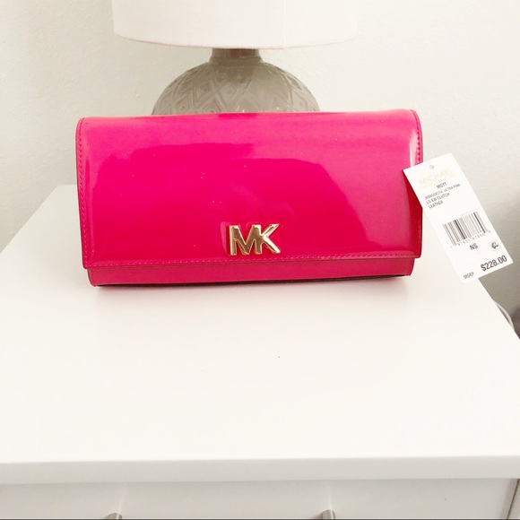 Michael Kors Handbags - NWT Michael Kors Ultra Pink Clutch Purse